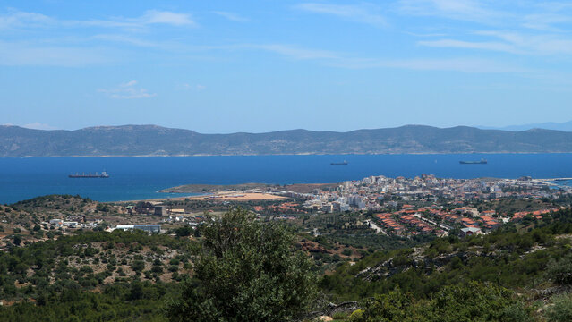 View of the city of Lavrion and the island of Makronisos in East Attica near Athens. Lavrion was a mining center during antiquity while in Makronisos political prisoners mainly communists where exiled