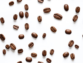Obraz premium Coffee beans scattered on white background, closeup detail. Seamless tileable background pattern. Generative AI
