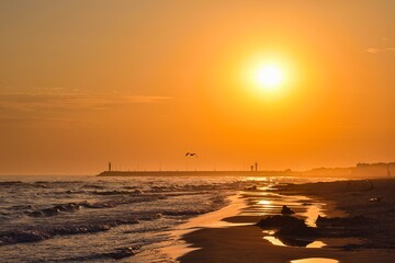 Colorful morning landscape on the Polish Baltic Sea. Sunrise on the beach in Leba, Poland. - 658740122