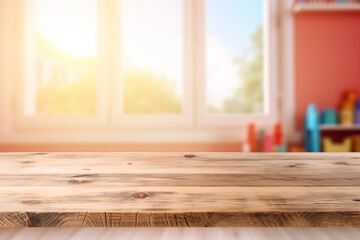 Empty wooden table top and blurred kids room interior on the background. Front view. Copy space for your object, product, toy presentation.