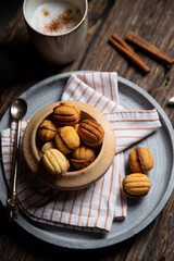 Homemade Russian Walnut Cookies with boiled condensed milk, Oreshki top view. Christmas card