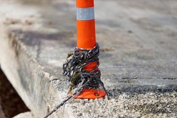 Thick hemp rope on the pier in the seaport.