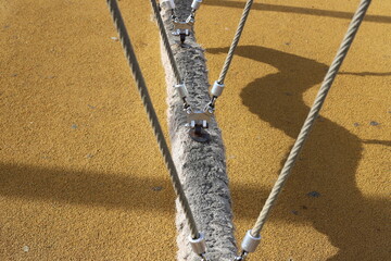 Thick hemp rope on the pier in the seaport.