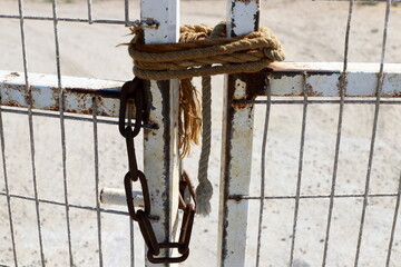 Thick hemp rope on the pier in the seaport.