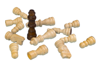 the winner king on the battlefield with the defeated pawns on the ground