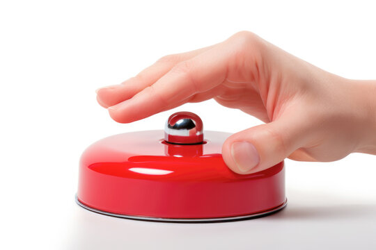The isolated image of a hand reaching out to ring the red bell at the hotel's front desk, seeking prompt service and attention.