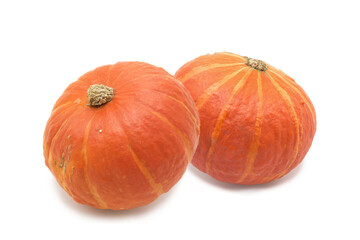 Fresh ripe organic pumpkins whole isolated on a white background.