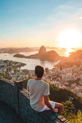 Printed kitchen splashbacks Rio de Janeiro person sitting on the top of the mountain in rio de janeiro