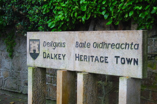 A photo of a stone Dalkey Heritage Town sign. 