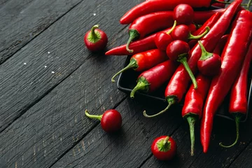 Selbstklebende Fototapete Scharfe Chili-pfeffer Red hot chili pepper composition, spicy organic paprika background