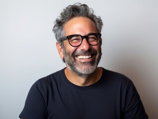 Obraz premium Happy european man in casual clothing against a neutral background