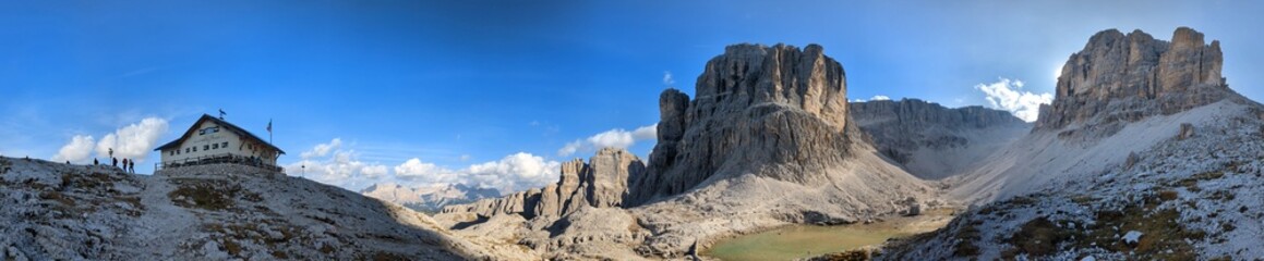 Fototapeta premium Beautiful landscape of Italian dolomites-with mountain meadows,lakes and rocky and sharp mountain tops,Dolomite Alps mountains, Trentino Alto Adige region, Sudtirol, Dolomites, Italy