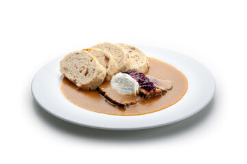 sirloin roast on cream with cranberries and bread dumpling