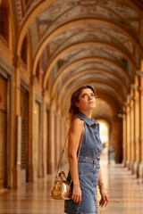 Fototapeta premium Young tourist woman was fascinated by the beauty of Bolono's famous porticoes.