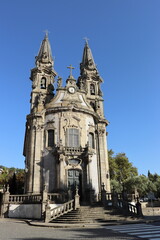 Guimaraes, Portugal; August 17, 2022: Facade of the church of Nosa Señora da Consolación, in Guimaraes (Portugal). Vertical image.