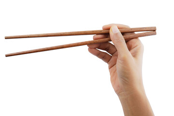 Hand holding wooden chopsticks isolated on transparent background.