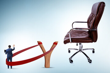 Career concept with businessman launched from slingshot