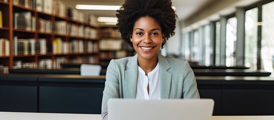 Smiling Black female professor teaching online from library facing camera With copyspace for text