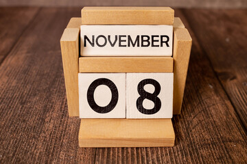 Calendar for November 8: name of the month in English, numbers 0 and 8 birch branch with