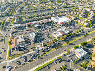 Buena Park, California – October 6, 2023: aerial drone view toward Buena Park Koreatown with H Mart, restaurants, houses, homes, apartments with Beach Blvd