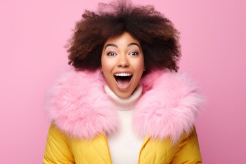 a woman with afro hair and pink fur collar - Powered by Adobe