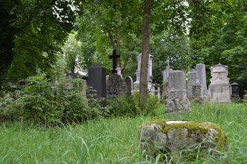 old stone cross in cemetery
