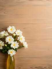 a bouquet of white flowers in a vase on a wood surface