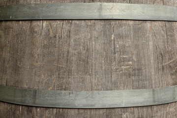 Traditional wooden barrel as background, closeup. Wine making