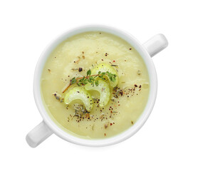 Bowl of delicious celery soup isolated on white, top view