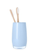 Fototapeta na wymiar Bamboo toothbrushes in holder isolated on white