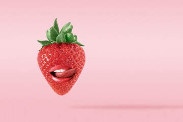 Abstract composition made of Strawberry with mouth and tongue, on bright pink background.Minimal summer fun concept.Creative art minimal aesthetic,with copy space for text.