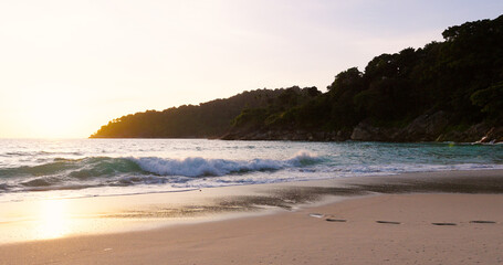 Amazing scene sunset tropical beach sea. New normal after covid-19. Phuket Thailand beautiful tropical beach with a sunset sky. Beautiful Phuket beach is a famous tourist destination in Andaman sea 