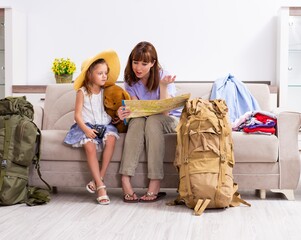 Happy family planning vacation trip