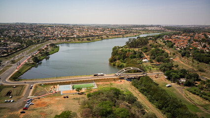 Aerial view of the Rio Preto municipal dam in drone panorama, aerial view on a sunny day with the avenues and highways and the park and the river in high resolution - Sao Jose do Rio Preto - Sao Paulo