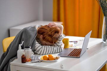 tired unhealthy female student lying on bed, she has no force, strength to study, learn new information, tiredness, ginger girl sleeping in front of computer exhaustion