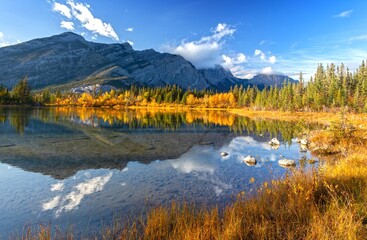 Scenic Autumn Colours Landscape, Tree Lined Many Springs Lake, Bow Valley Provincial Park, Alberta Foothills Canadian Rocky Mountains Panorama - obrazy, fototapety, plakaty