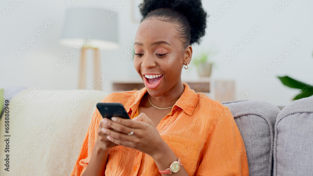 Wall mural Excited, phone chat or black woman on couch in communication in house living room to relax. Smile, wow or happy African person texting or reading online gossip in a mobile app discussion on sofa