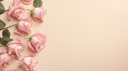 Fototapeta na wymiar Pink roses frame on beige background, top view.