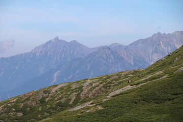 Fototapeta na wymiar 乗鞍岳の風景。乗鞍から見る槍ヶ岳。乗鞍岳は飛騨山脈南部にある剣ヶ峰を主峰とする山々の総称。