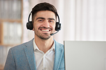 Portrait, businessman and smile in happiness with headset for job, customer support or telecom in office. Caucasian, person and employee with joy on face for work in call centre sales or help desk