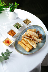 Variety of tasty delicious snacks on the rich table