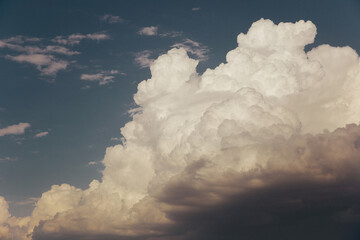 The big clouds in the blue sky