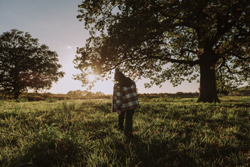 A boy having fun at the meadow, joy