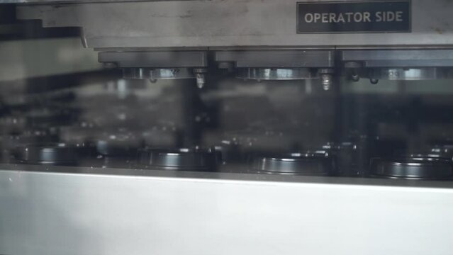 Paper Coffee Cup Lid Making Machine. The plastic injection part manufacturing concept.