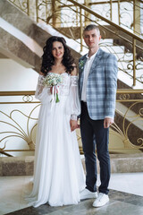 Fototapeta premium Full length view of happy loving newlywed couple. Concept wedding. Happy family. Bride and Groom, Together.