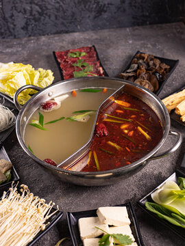 delicious asian bouillon with a lot of extra ingredients. View from above. Chinese cuisine, ingredient for hotpot