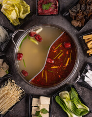 delicious asian bouillon with a lot of extra ingredients. View from above. Chinese cuisine,...