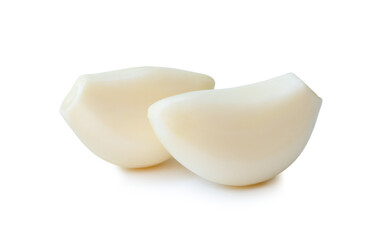 Front view of fresh garlic cloves in stack isolated on white background with clipping path and shadow in png file format. Close up photo