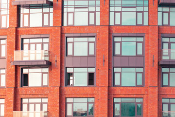 Fototapeta premium The walls of a multi-story building as a background. Texture