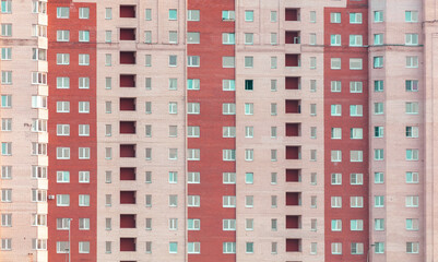 The walls of a multi-story building as a background. Texture